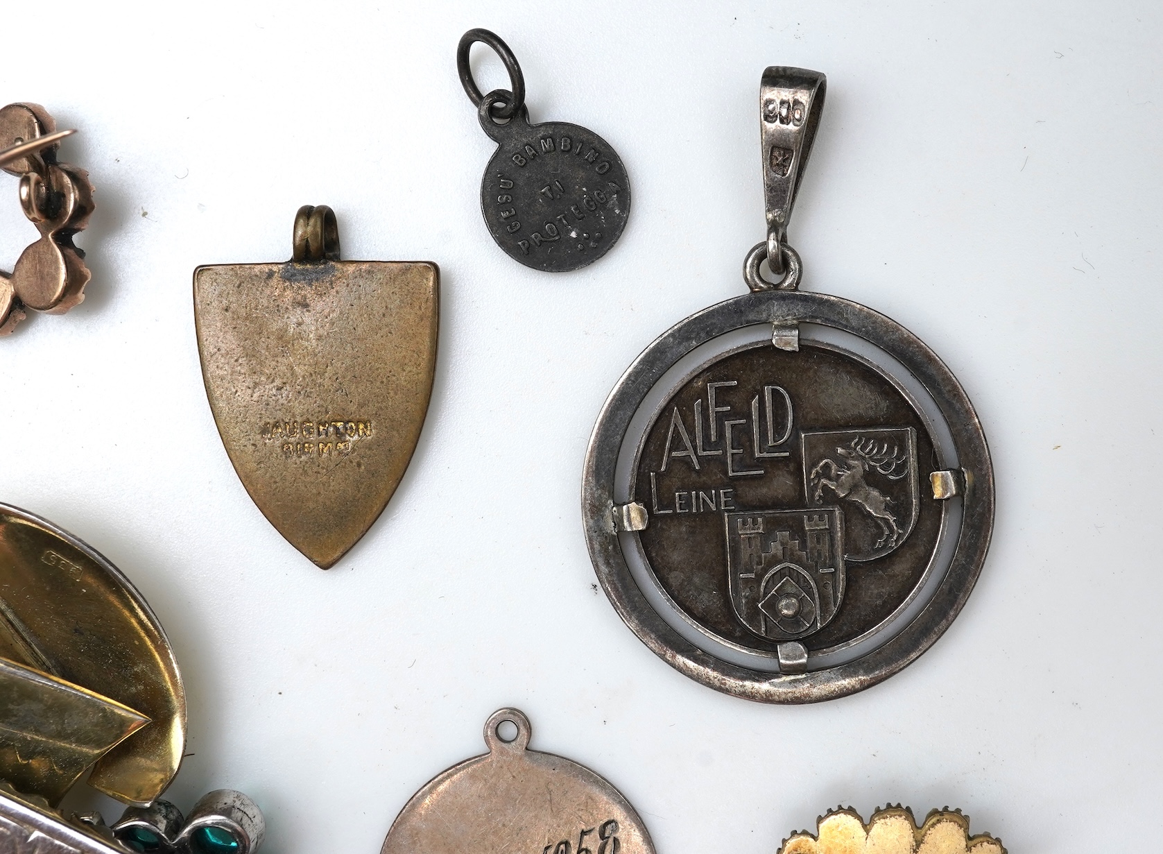 A small group of assorted collectables and jewellery including a Dunhill lighter, 64mm, a George V silver and enamel small compact, silver thimble, two Victorian garnet set brooches, an Edwardian 9ct, amethyst and seed p